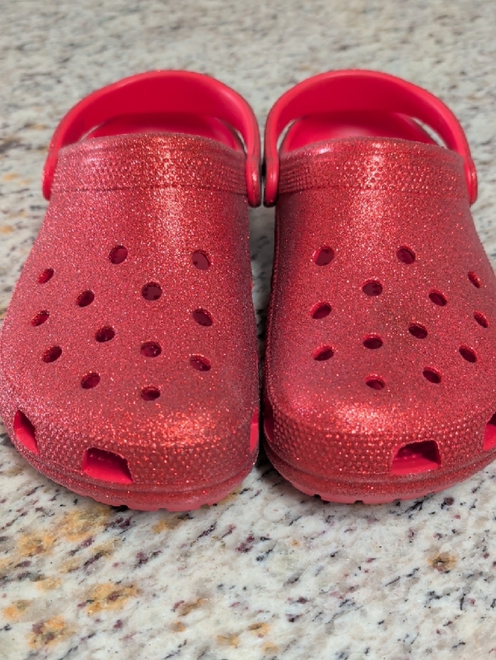 CROCS Glitter Slip-On Clogs in Red